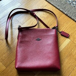 Classic Red Coach crossbody purse.